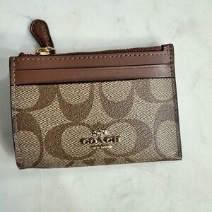 Coach Mini Skinny ID Case In Signature Canvas. Style F88208. Color IME74.